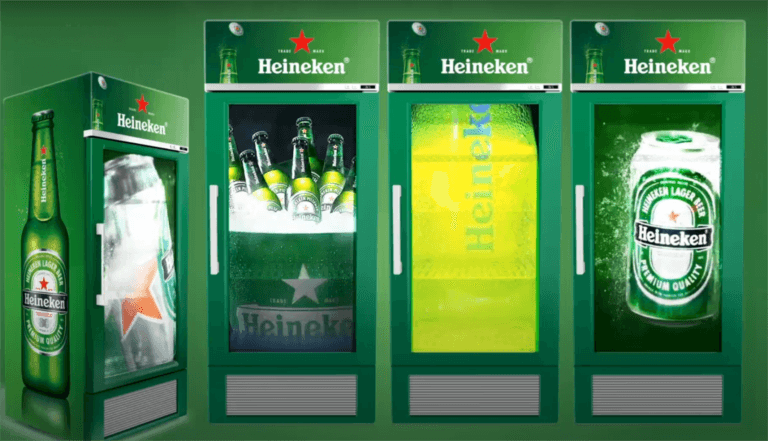 A beverage cooler with a bright LCD ad display in a modern convenience store