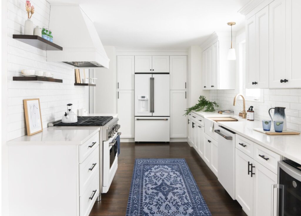 A bright, airy kitchen with classic white appliances.