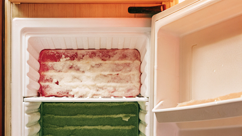 a bad defrost timer causing frost buildup inside a refrigerator