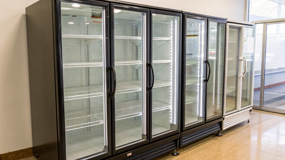 A price tag on a commercial glass door refrigerator