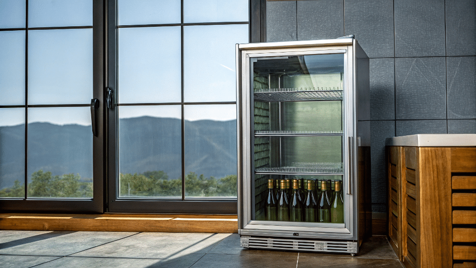 Different types of commercial beverage coolers side-by-side.