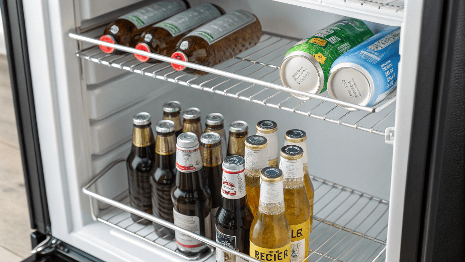 A perfectly stocked beverage fridge with various drinks