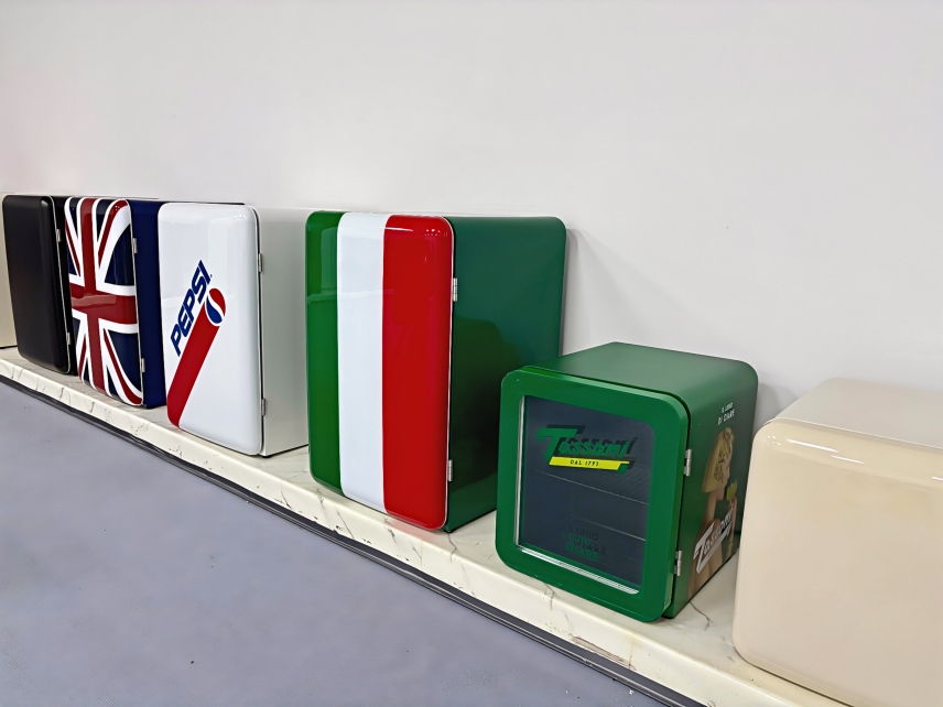 A row of refrigerators in various custom colors