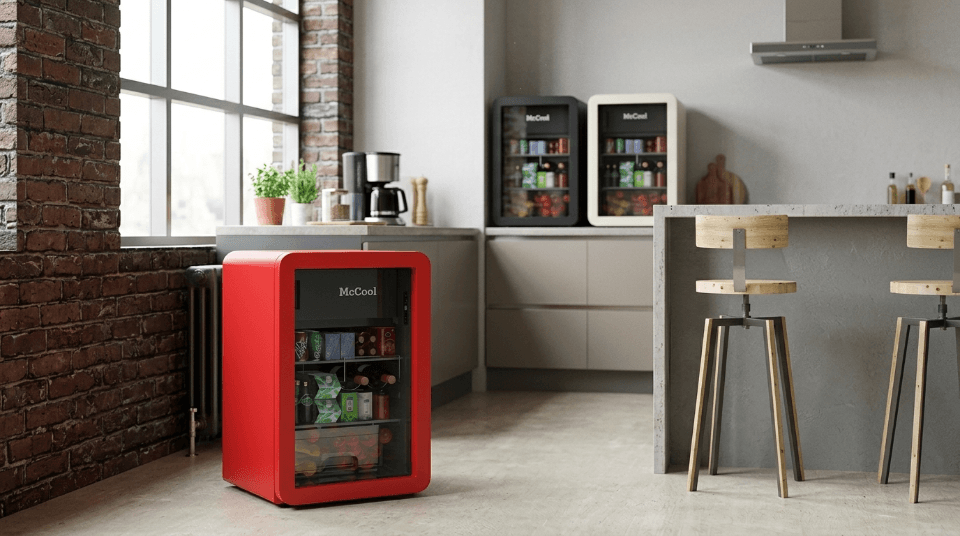 A stylish compact fridge in a small, modern kitchen