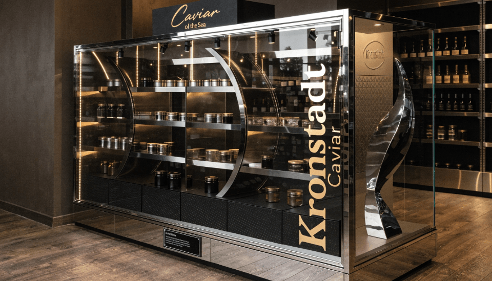 A bespoke display refrigerator with custom branding for a luxury product